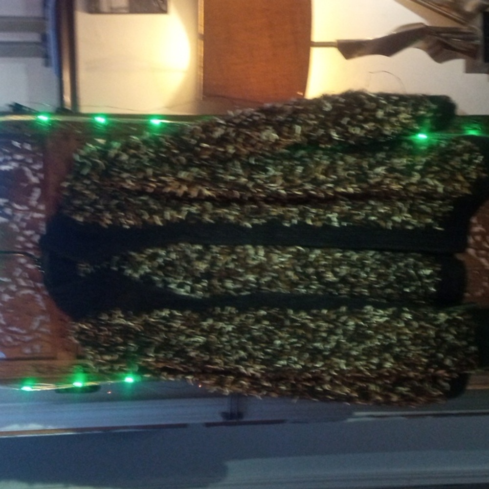 Women's hand made knitted sweater, looks like a L, very nice with pockets